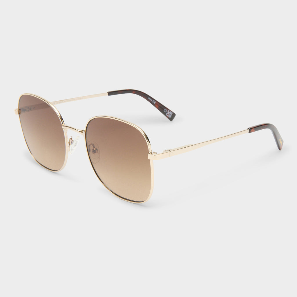 ★Le Specs★morphosis ティント サングラス オーストラリア Metamorphosis Gold Female Round Sunglasses | Le Specs
