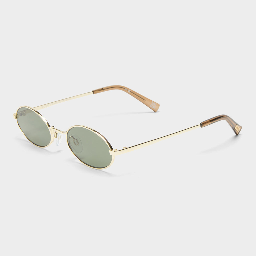 【関税込み】Le Specs ゴールド Love Train サングラス Love Train Bright Gold Female Oval Sunglasses | Le Specs
