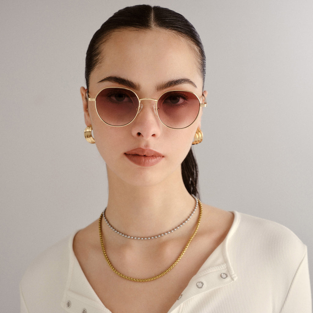 Odyssey Bright Gold Uni-Sex Round Sunglasses | Le Specs display picture 1