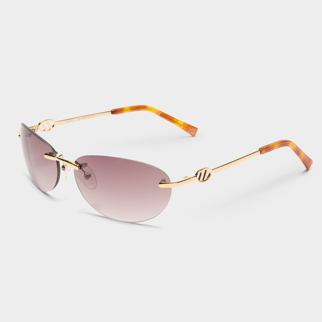 【関税込み】Le Specs SSENSE限定 ゴールド Slinky サングラス Slinky Gold Female Oval Sunglasses | Le Specs