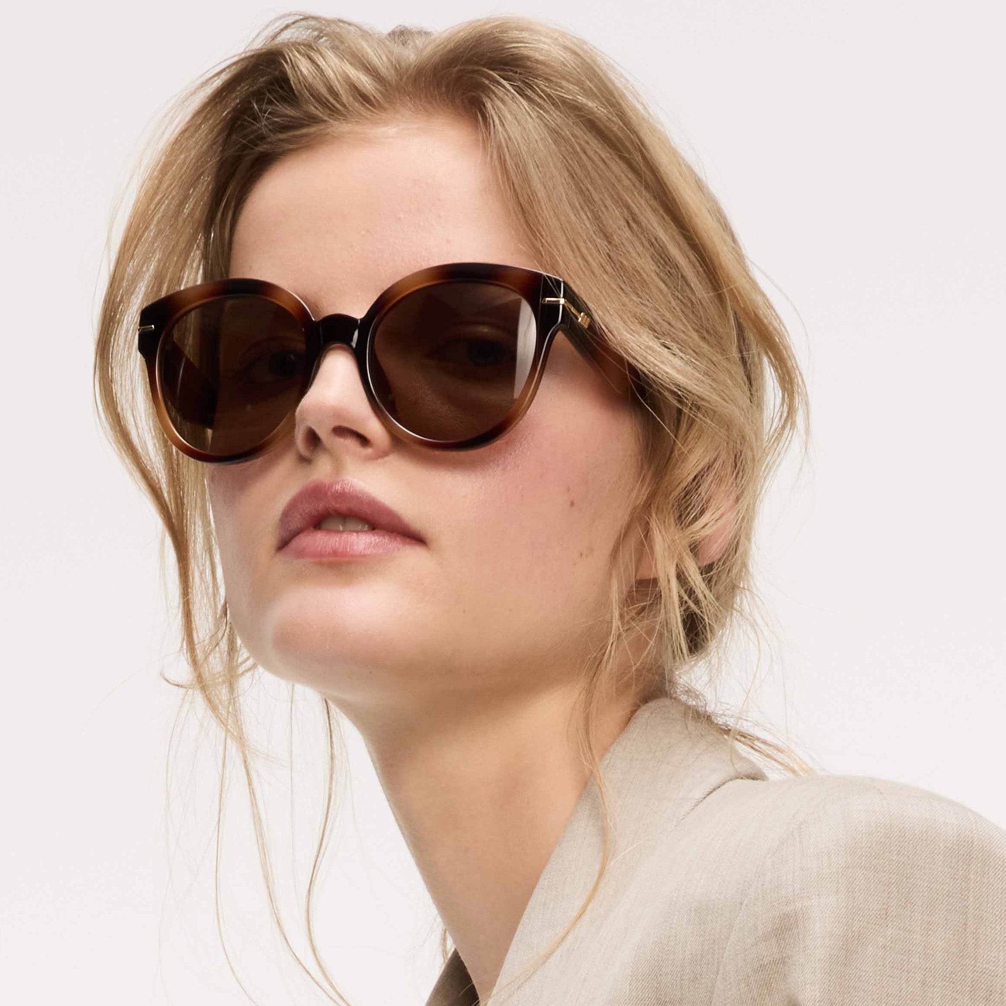 Capacious Tort Female Round Sunglasses | Le Specs