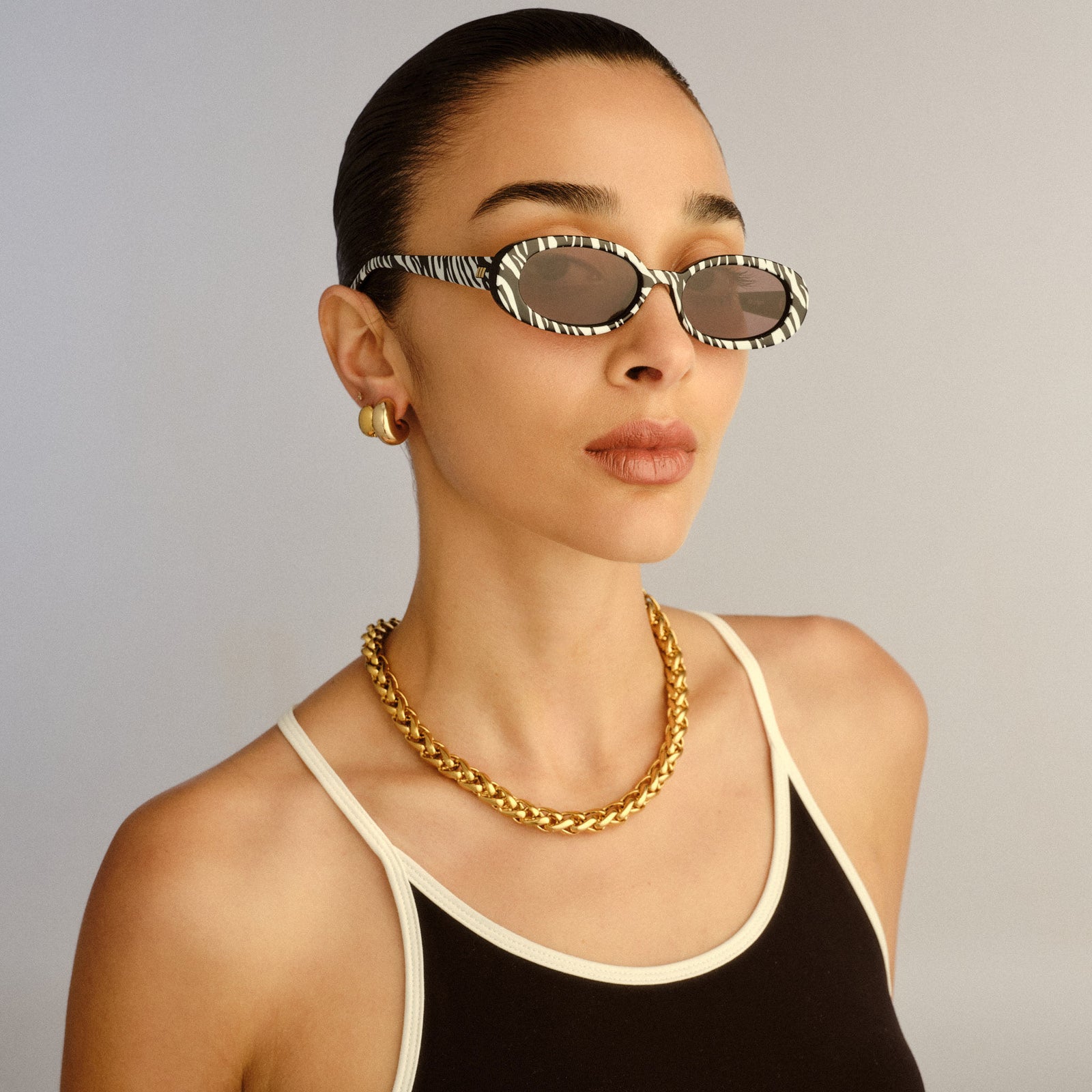Outta Love White Tiger Uni-Sex Oval Sunglasses | Le Specs