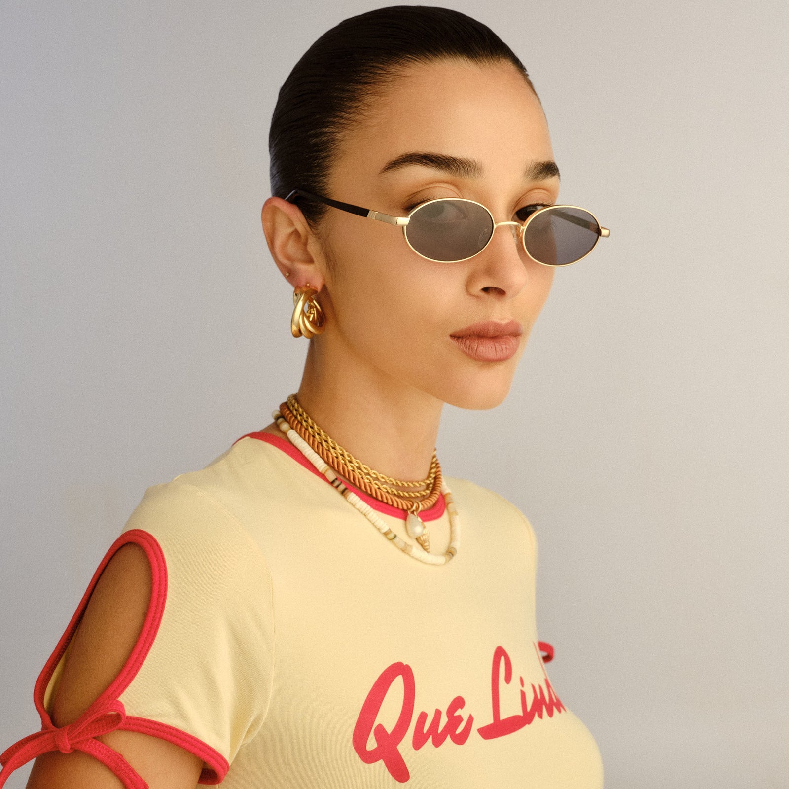 Icicle Bright Gold Uni-Sex Oval Sunglasses | Le Specs