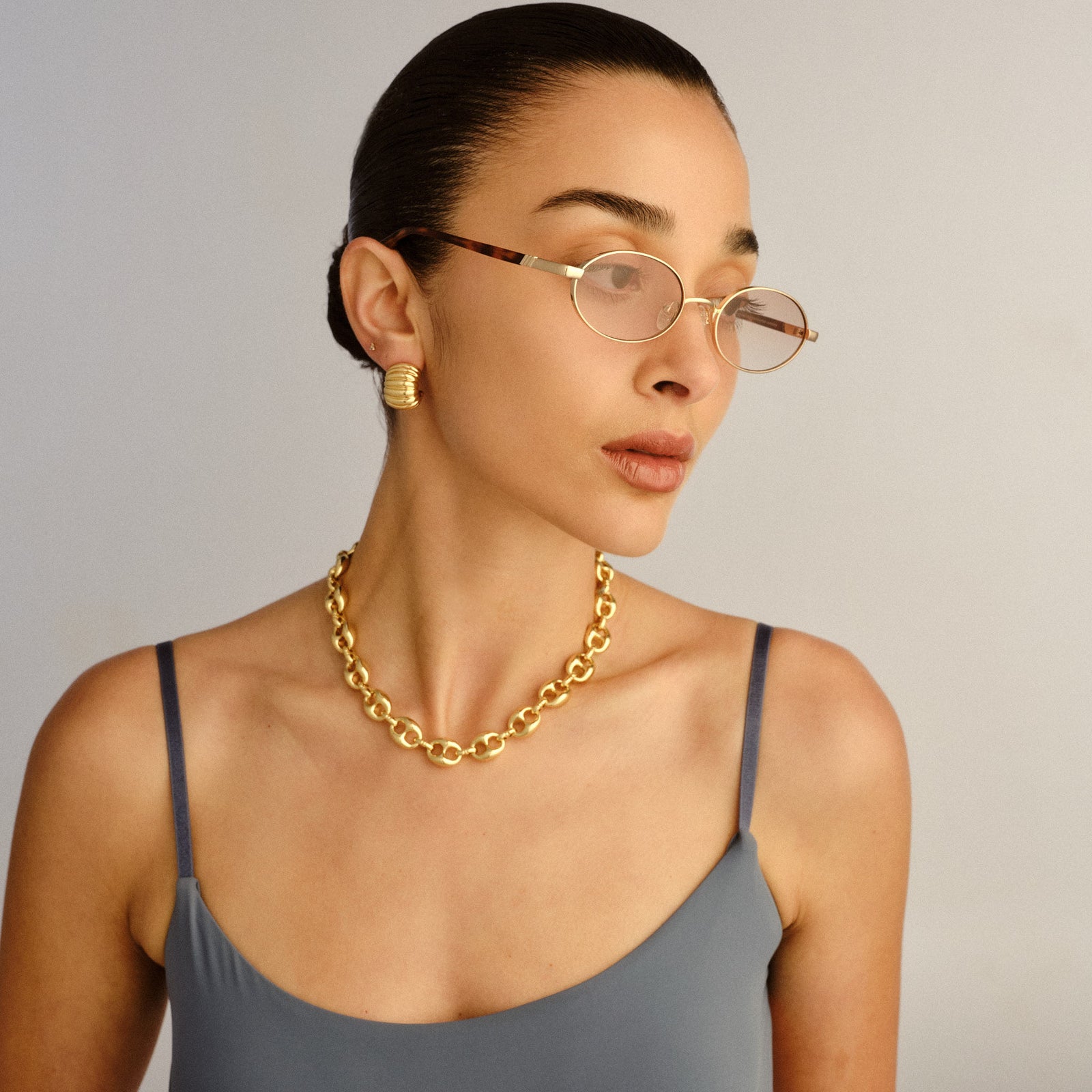 Icicle Bright Gold Uni-Sex Oval Sunglasses | Le Specs