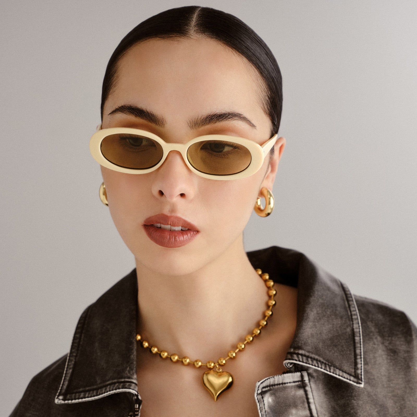 Outta Love Off White Female Oval Sunglasses | Le Specs