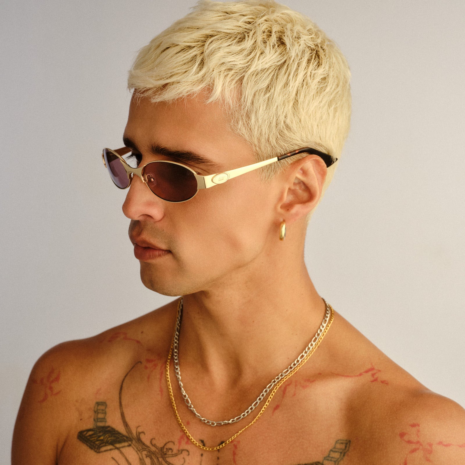Frostbite Bright Gold Uni-Sex Oval Sunglasses | Le Specs
