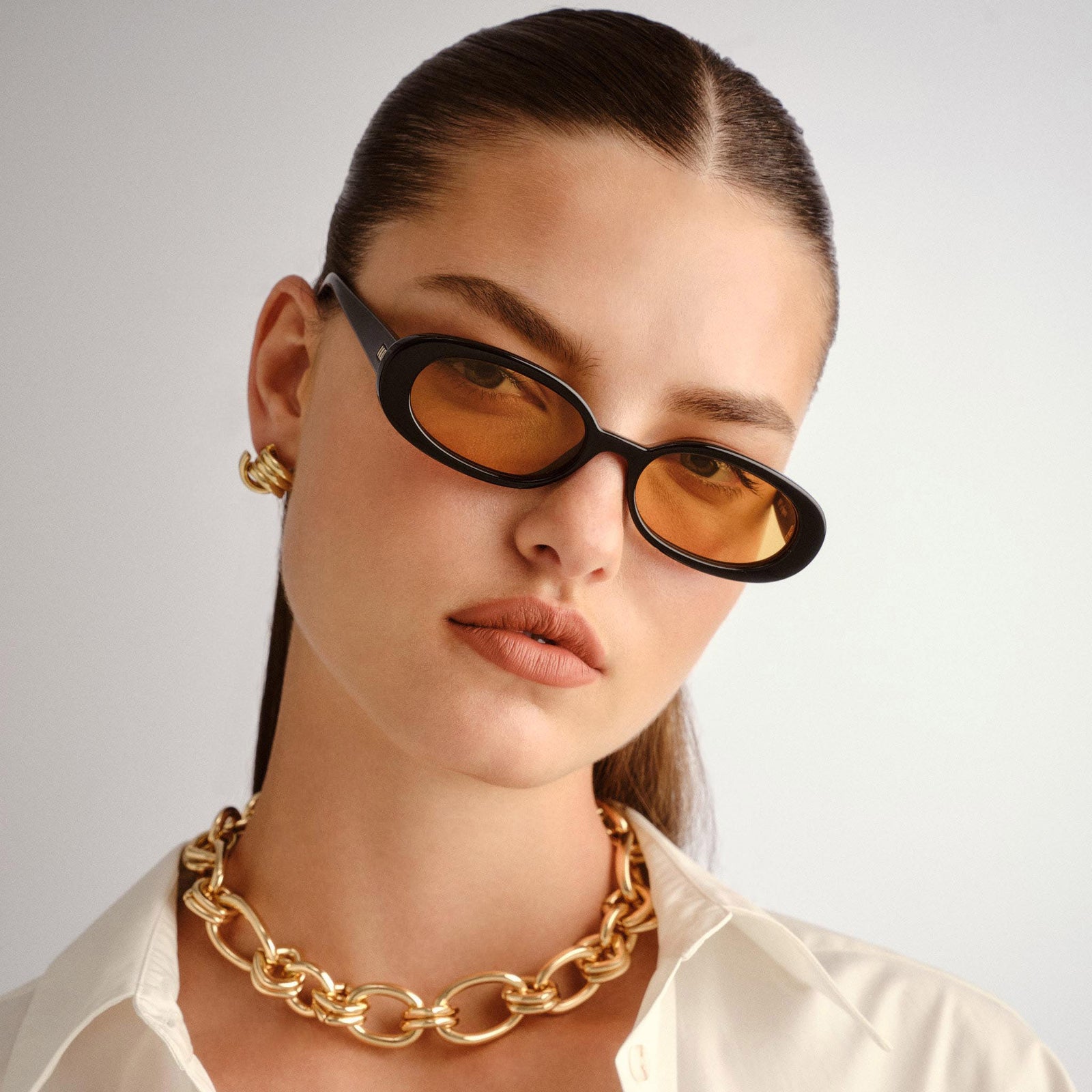 Outta Love Black Female Oval Sunglasses | Le Specs