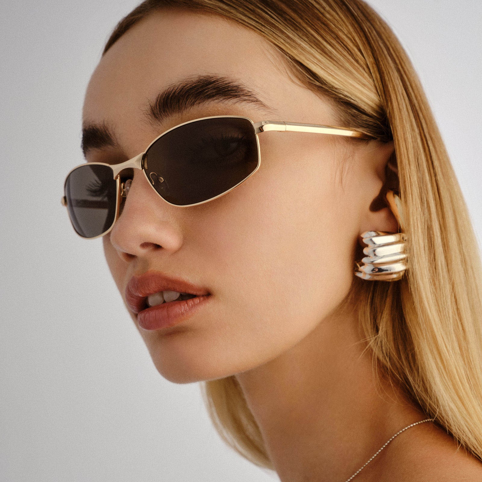 Star Beam Bright Gold Uni-Sex Wrap Sunglasses | Le Specs