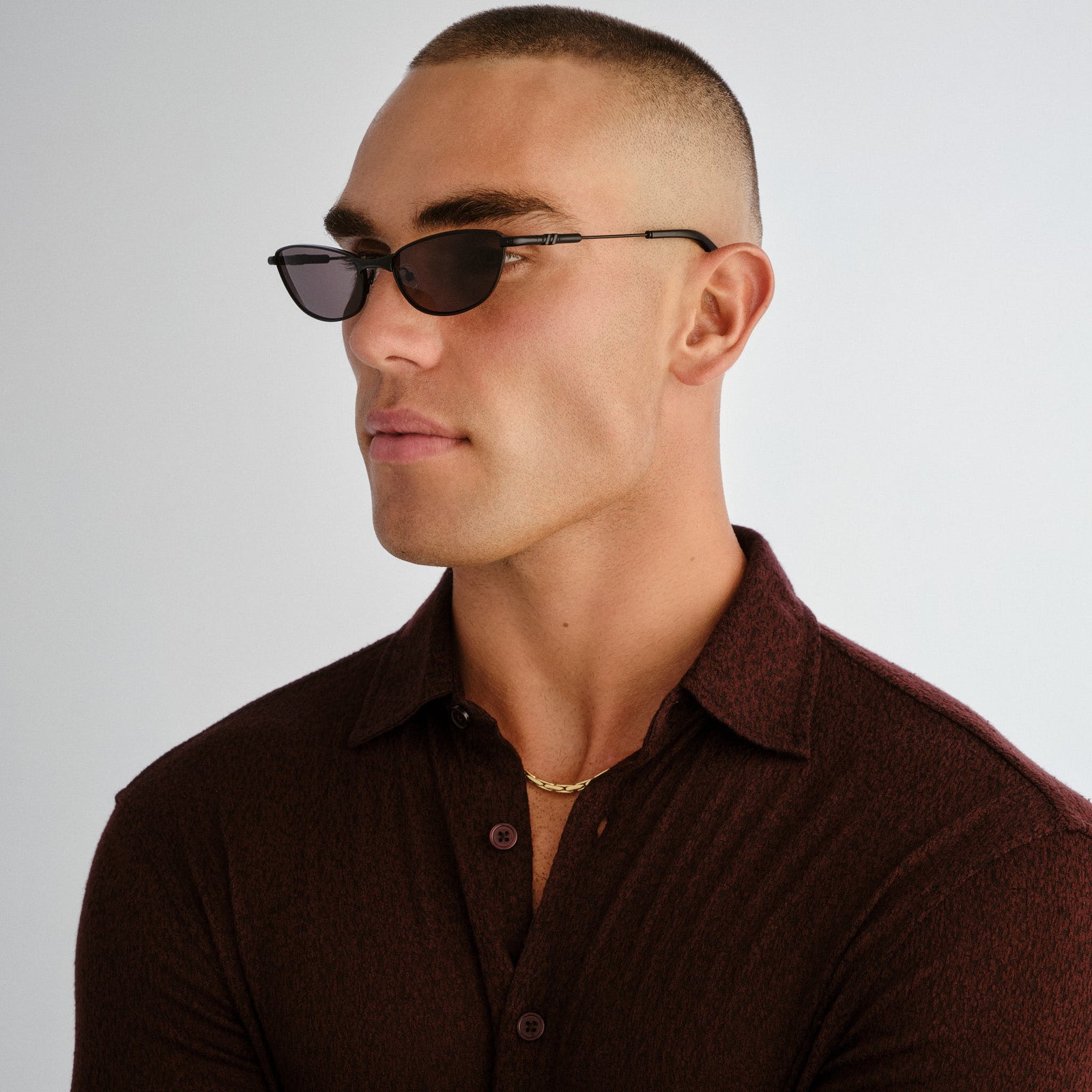 Thorned Black Uni-Sex Oval Sunglasses | Le Specs