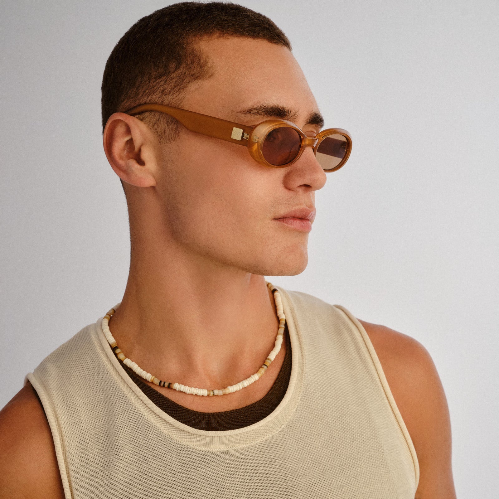 Work It Gold Pearl Uni-Sex Oval Sunglasses | Le Specs