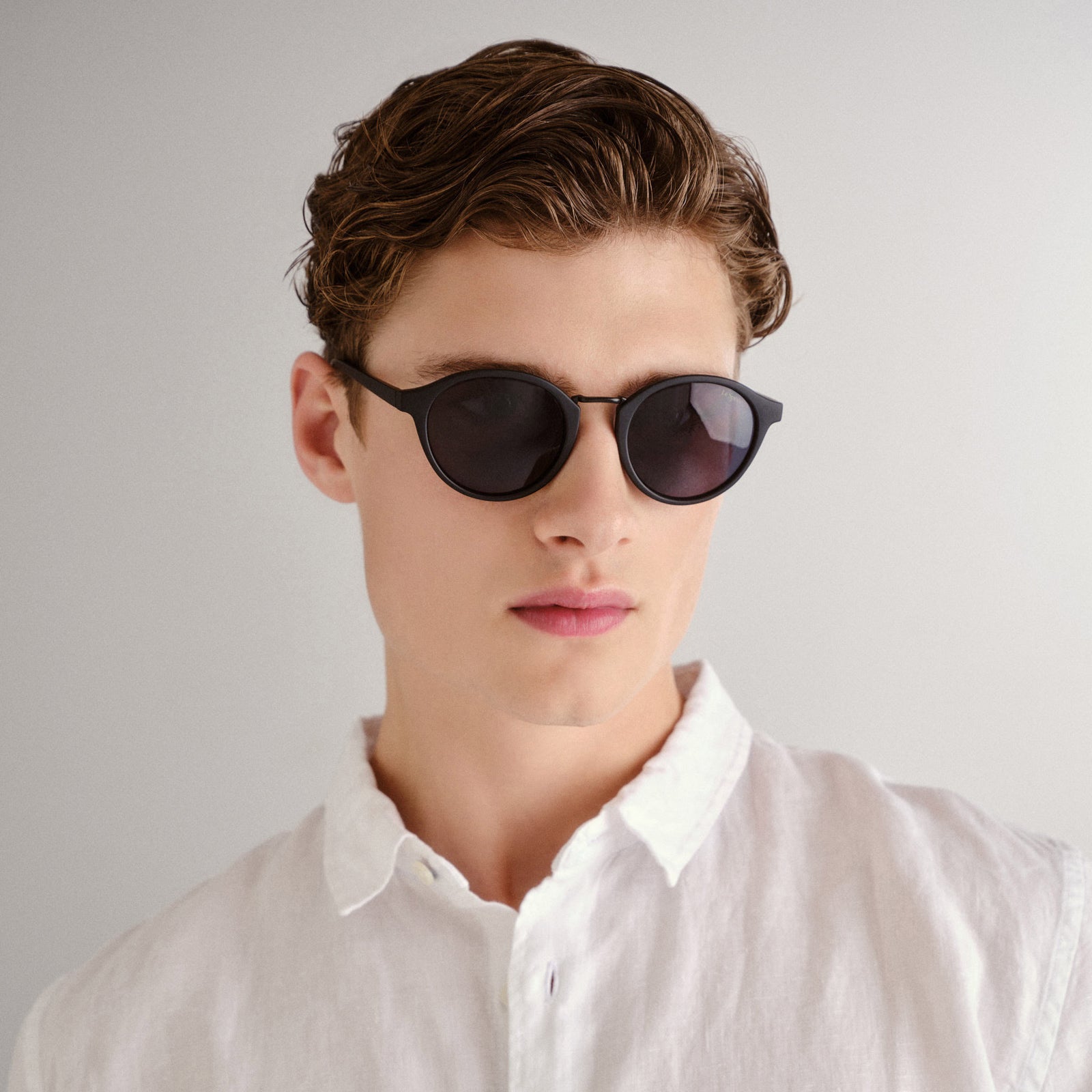 Paradox Matte Black Uni-Sex Round Sunglasses | Le Specs