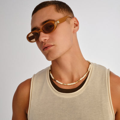 Work It! Gold Pearl Uni-Sex Oval Sunglasses | Le Specs